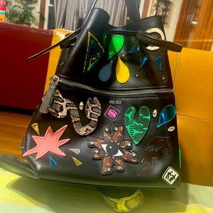 Authentic Pre-Owned KENZO Bag. Multi functional, all leather, looks brand new.